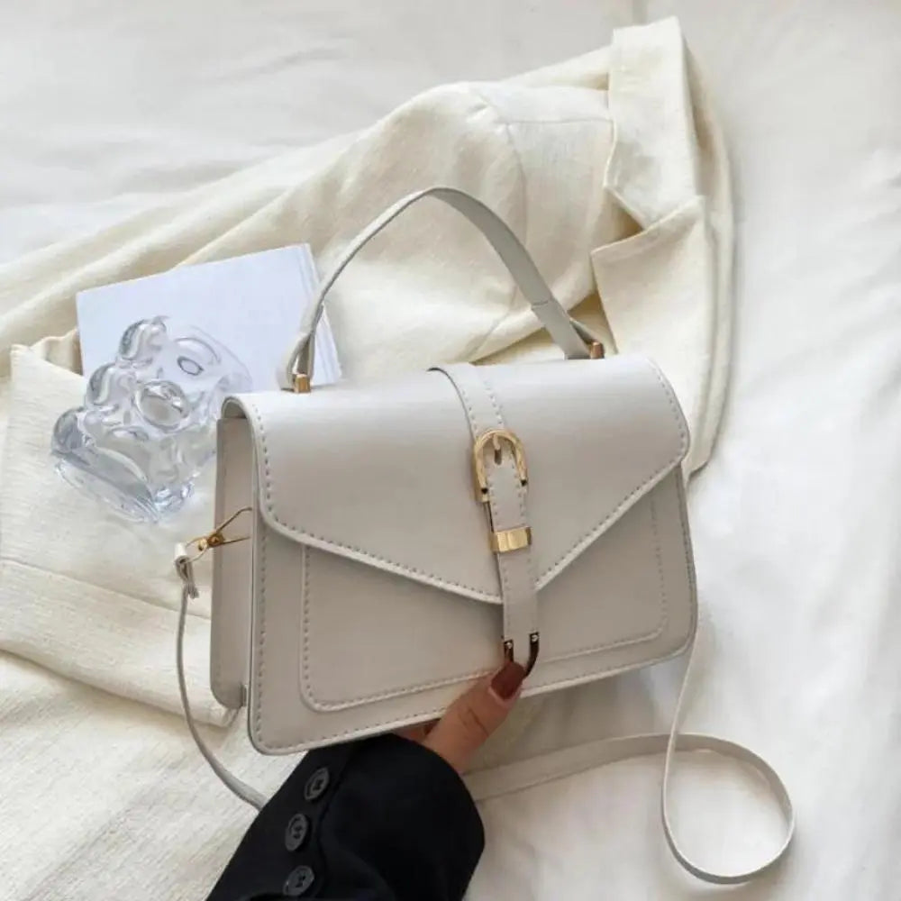 Sorel | Minimalist Crossbody Bag with Buckle Closure