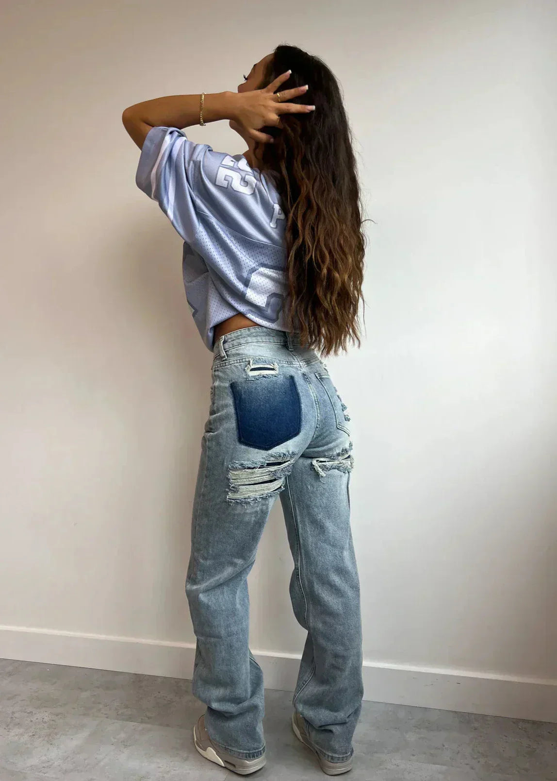 Burgina | Retro Distressed Jeans Featuring Distinctive Patchwork Accents