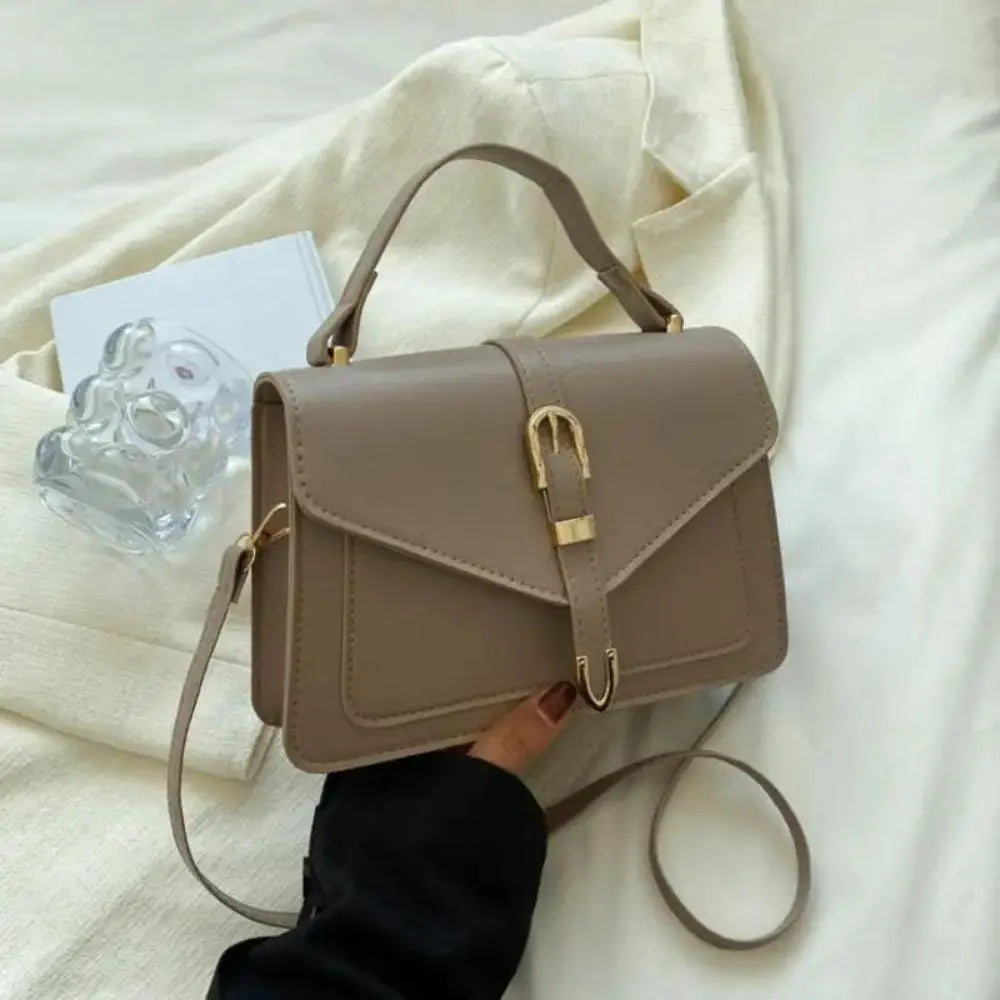 Sorel | Minimalist Crossbody Bag with Buckle Closure