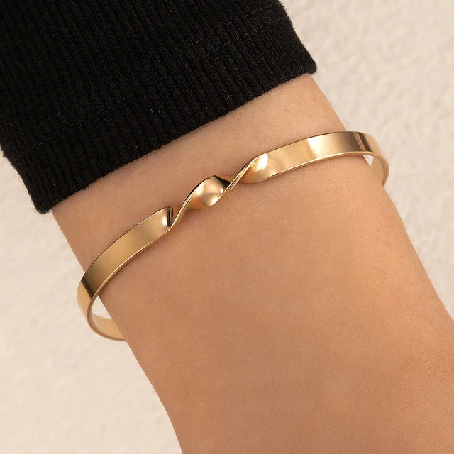 Adjustable Women's Bracelet with Cross Design in Gold Tone