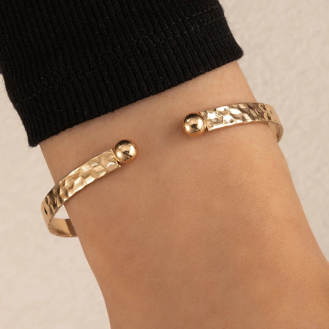 Adjustable Women's Bracelet with Cross Design in Gold Tone