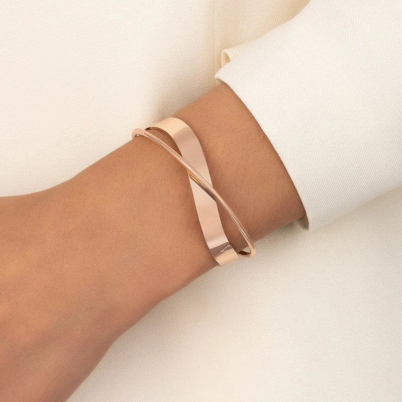 Adjustable Women's Bracelet with Cross Design in Gold Tone