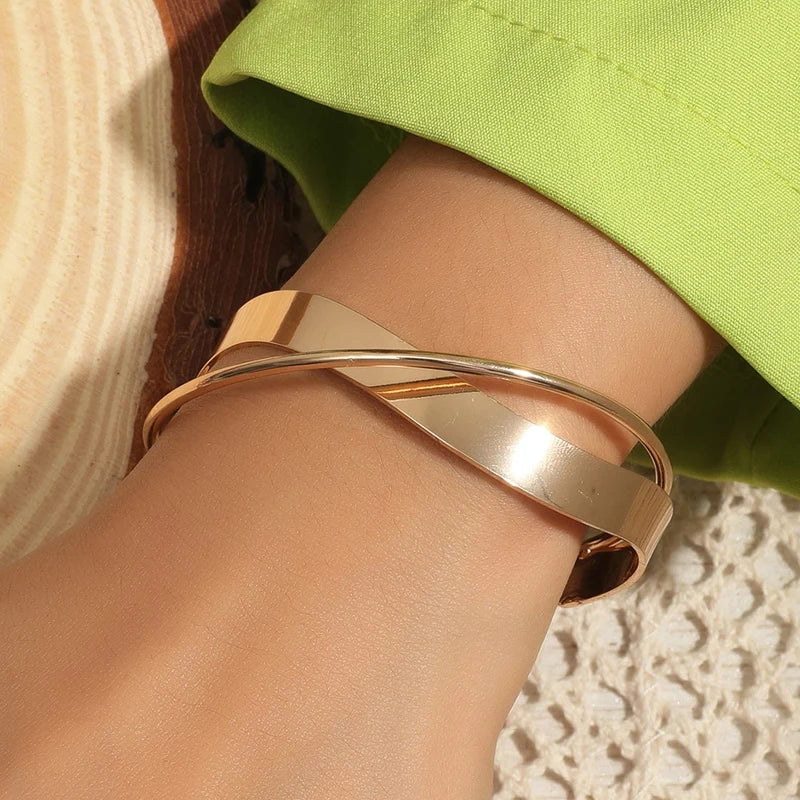 Adjustable Women's Bracelet with Cross Design in Gold Tone